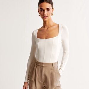 White long sleeve body suit